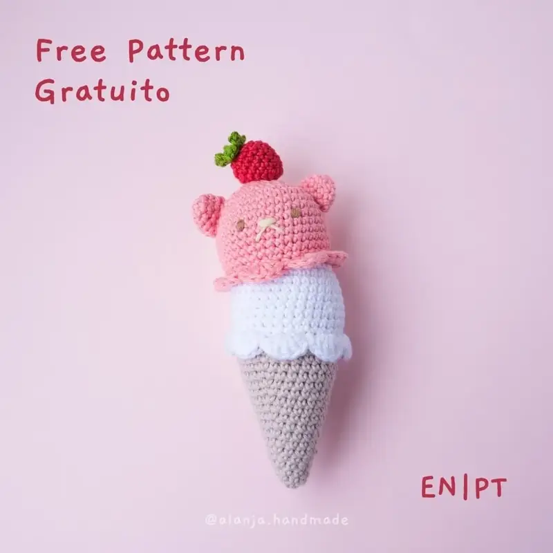 How to Crochet a Strawberry Ice Cream (Free Beginner Amigurumi Pattern), the finished crochet build, photographed on a plain surface
