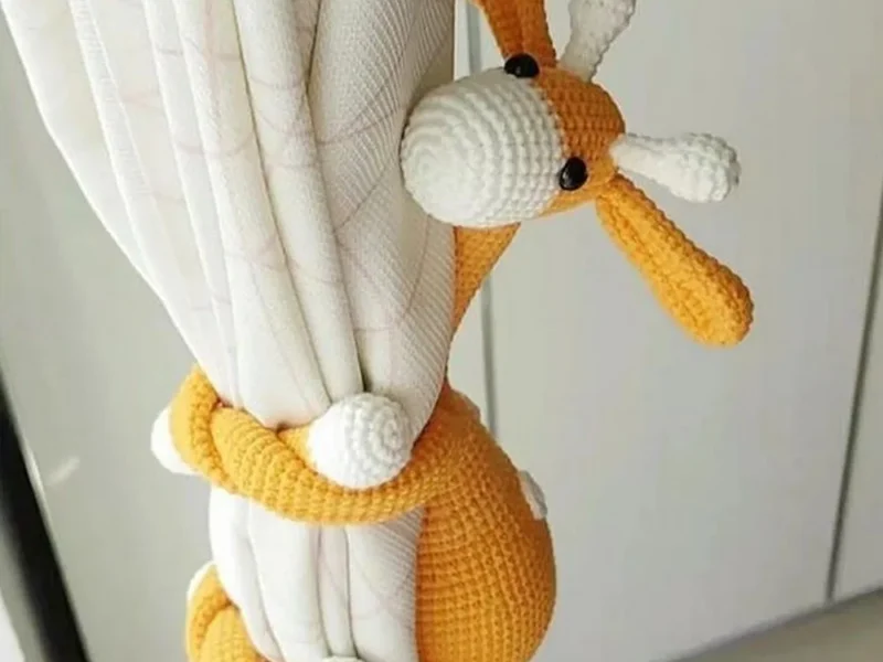 Crochet Giraffe Amigurumi — Free Pattern, the finished crochet build, photographed on a plain surface