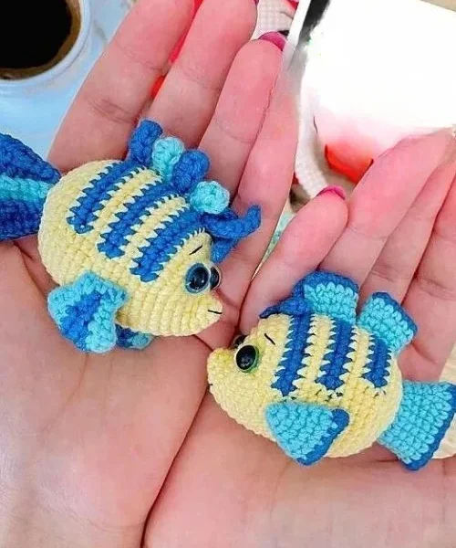 How to Crochet an Adorable Fish Amigurumi, the finished crochet build, photographed on a plain surface